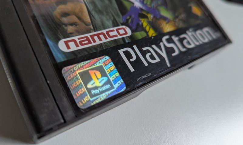 A picture of the Black Label and Hologram on a PlayStation case