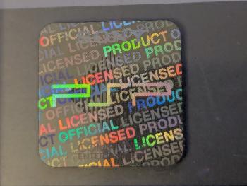 The PSP hologram design on a PS1 case, showing the PSP logo