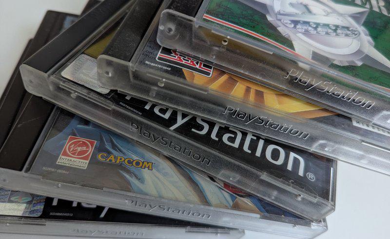 A stack of PlayStation One Games