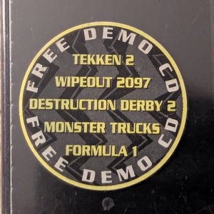 Round, yellow, grey, 'FREE DEMO CD'